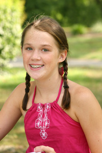 photo of young girl with braces